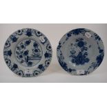 A Delft plate, decorated flowers and fol