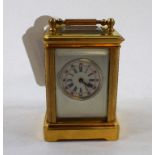 A miniature brass carriage timepiece, 7.