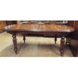 A Victorian style mahogany dining table,