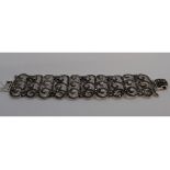 A silver and marcasite wide bracelet