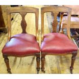 A set of eight Victorian walnut dining c