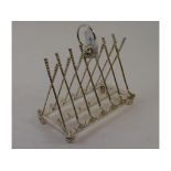 A novelty plated golfing toast rack