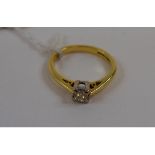 An 18ct gold and princess cut solitaire