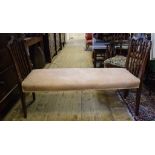 An upholstered window seat,