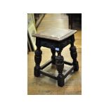 A 17th century style carved oak joint stool,