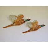 A Beswick Pheasant wall plaque, 661/2, another, 661/3, both gloss,