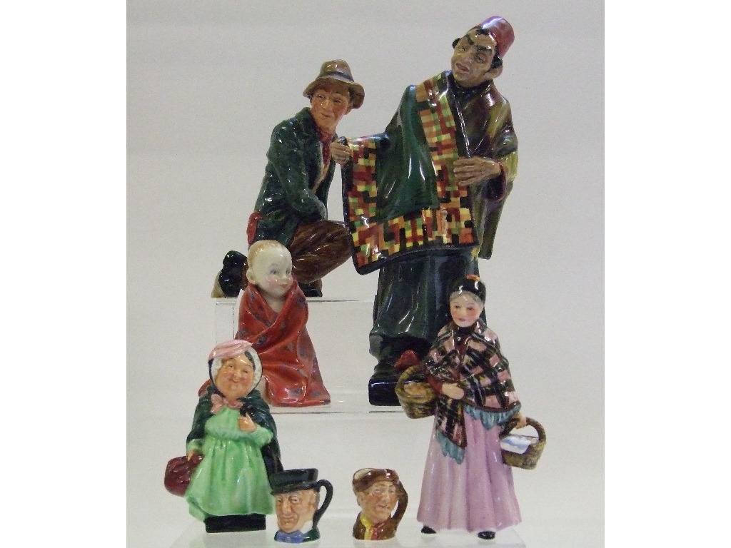 A Royal Doulton figure, Carpet Seller, HN1404, two tiny character jugs,