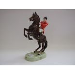 A Beswick Huntsman, rearing, style 2, brown, 868,