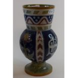 A Royal Doulton stoneware vase, decorated flowers and foliage, a cross, and monogram, 7466, 27.