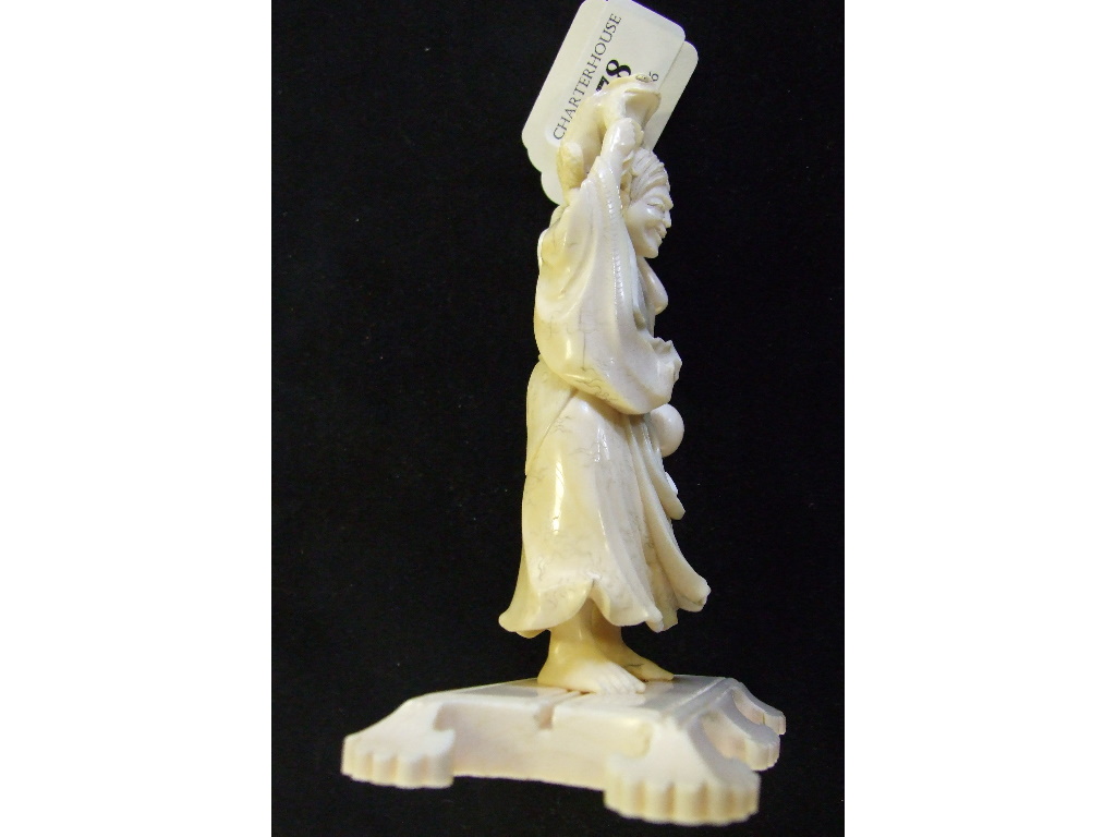 A Japanese carved ivory figure, holding a toad aloft, on a plinth base, 14. - Image 17 of 27