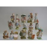 Fifteen Royal Albert Beatrix Potter figures, including Pigling Eats His Porridge,