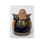 A Royal Doulton stoneware inkwell, in the form of a baby, 9620/327, Rg No 537199 (restored), 8.