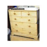 A Victorian stripped pine chest, of five drawers,