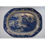 An early 19th century Willow pattern blue and white transfer printed meat plate, of octagonal form,