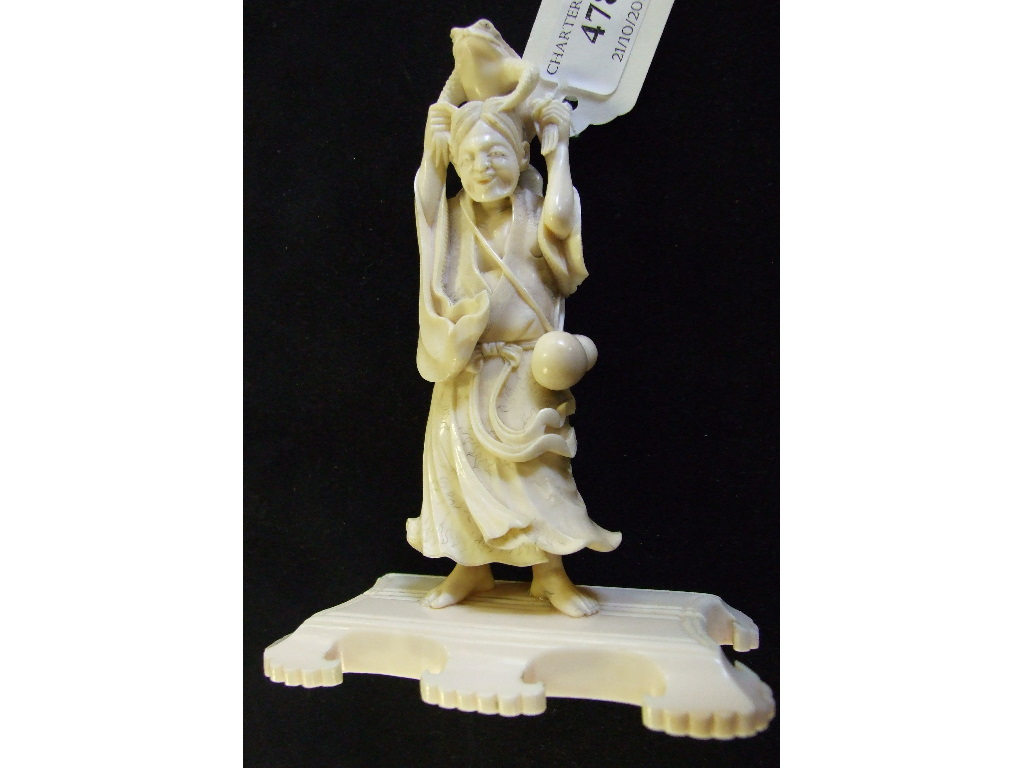A Japanese carved ivory figure, holding a toad aloft, on a plinth base, 14. - Image 5 of 27