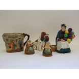 A Royal Doulton figure, The Old Balloon Seller, HN1315, a Series Ware jug, Peggotty,