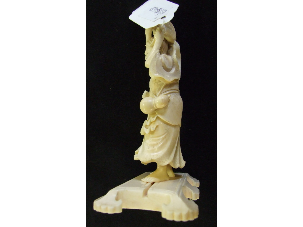 A Japanese carved ivory figure, holding a toad aloft, on a plinth base, 14. - Image 8 of 27