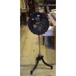 A Regency pole screen,