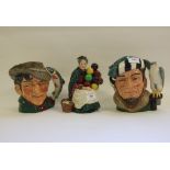 A Royal Doulton figure, The Old Balloon Seller, HN1315, two character dogs, HN1103 and HN1159,