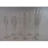 A set of eleven Royal Brierley Millennium edition etched and cut champagne flutes,