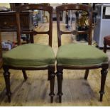 A set of six Victorian mahogany dining chairs,