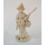 A Japanese carved ivory figure, a lady playing a musical instrument, 14.