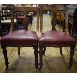 A set of eight Victorian walnut dining chairs,