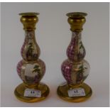 A pair of late 19th century Dresden style porcelain double gourd candlesticks,