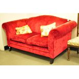 An upholstered two seater settee,