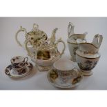 A 19th century English porcelain part tea service, painted landscapes and with gilt decoration,