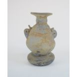 A Roman style glass vessel,