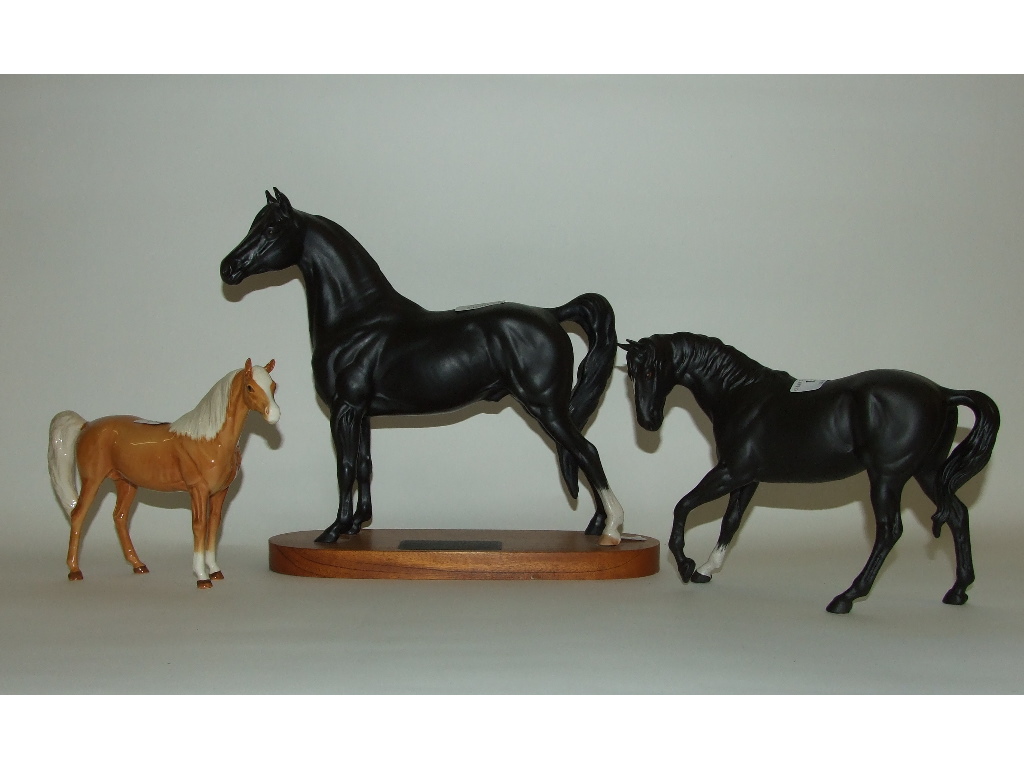 A Beswick Connoisseur Morgan Stallion, 2605 (ear chipped), a Black Beauty, 2466,