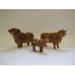 A Beswick Highland Bull, 2008, a Highland Cow, 1740, and a Highland Calf, 1827D,