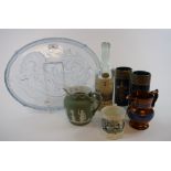 A 19th century printed pottery mug, an Art Deco style glass tray, decorated a mermaid,