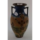 A Doulton Lambeth Art Union of London stoneware vase, decorated flowers and foliage,