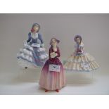 A Royal Doulton figure, Dorcas, HN1558, and two others, Hannah, HN3655, and Daydreams,