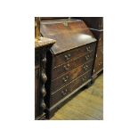 A George III oak bureau,