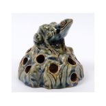 A Royal Doulton Lambeth stoneware flower block, in the form of a frog on a rock, 10.