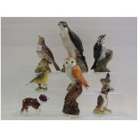 A Beswick Songthrush, 2309, a Lesser Spotted Woodpecker, 2420 (chip to tail feathers),