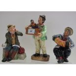 A Royal Doulton figure, Organ Grinder, HN2173, and two others, Jolly Sailor, HN2172, and 'Owd,