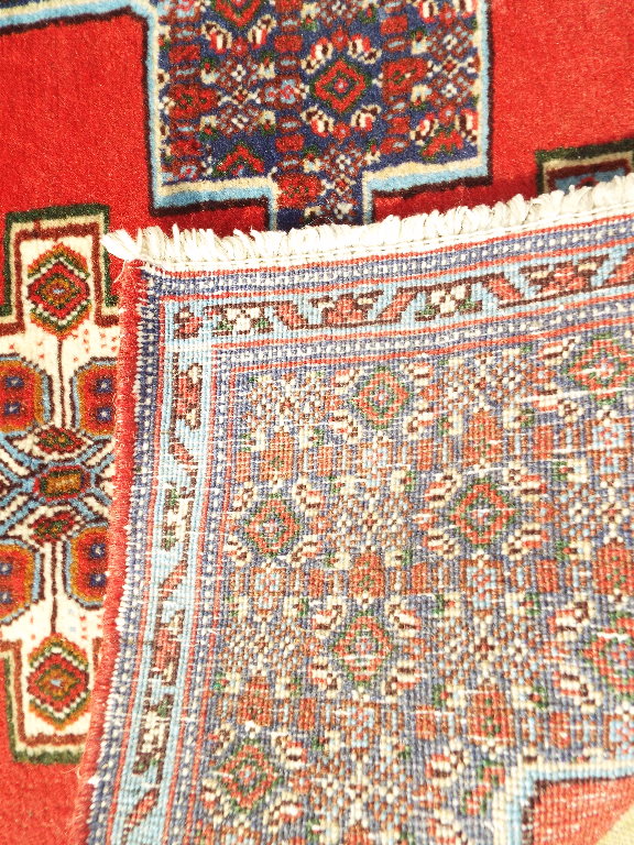 A Persian rug, with a triple medallion o - Image 10 of 11