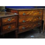 An inlaid mahogany bow front chest, of t