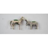 A novelty silver donkey pincushion, and