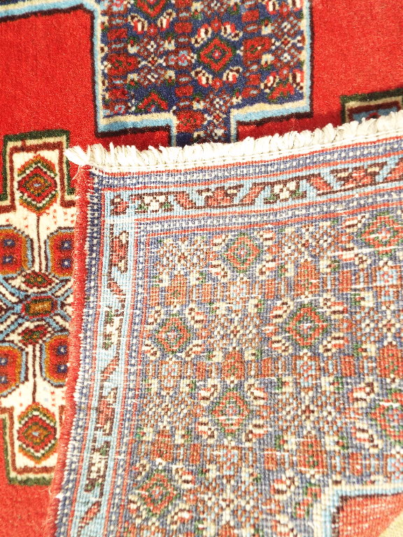 A Persian rug, with a triple medallion o - Image 8 of 11