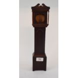 A mahogany pocket watch holder, in the f