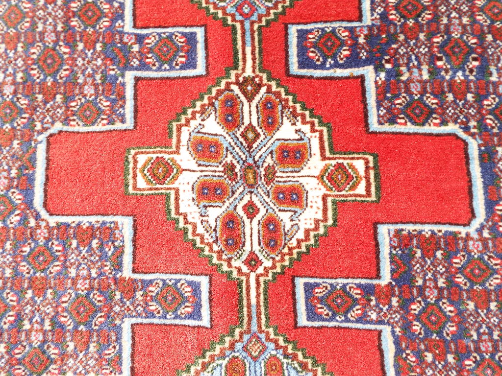 A Persian rug, with a triple medallion o - Image 4 of 11