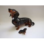 A Beswick Fireside Dachshund, black/tan,