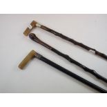 A late Victorian ebonised walking cane,