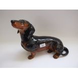 A Beswick Fireside Dachshund, black/tan,