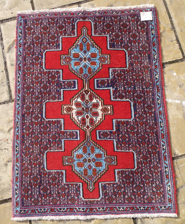 A Persian rug, with a triple medallion o - Image 3 of 11